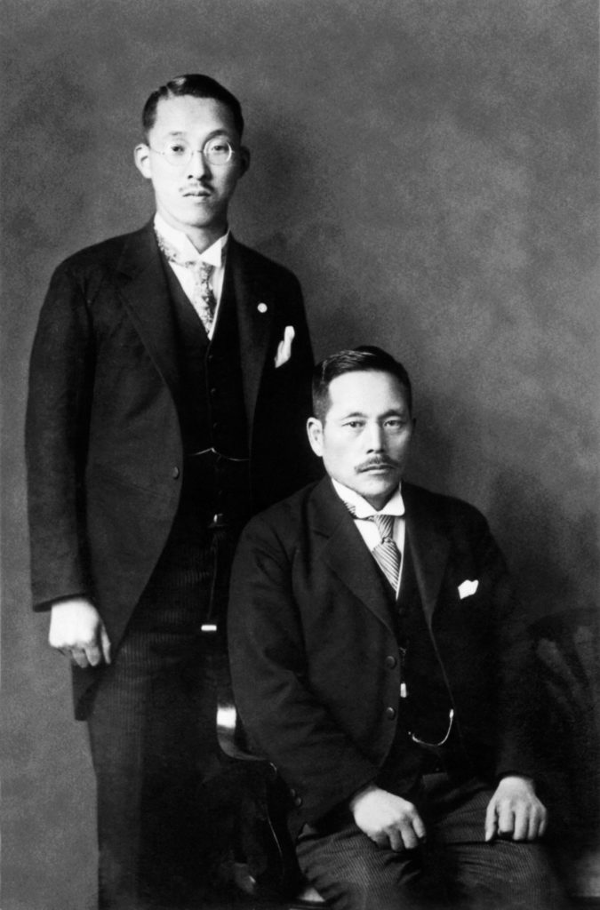 First Soka Gakkai President Tsunesaburo Makiguchi seated and second Soka Gakkai President Josei Toda standing behind him